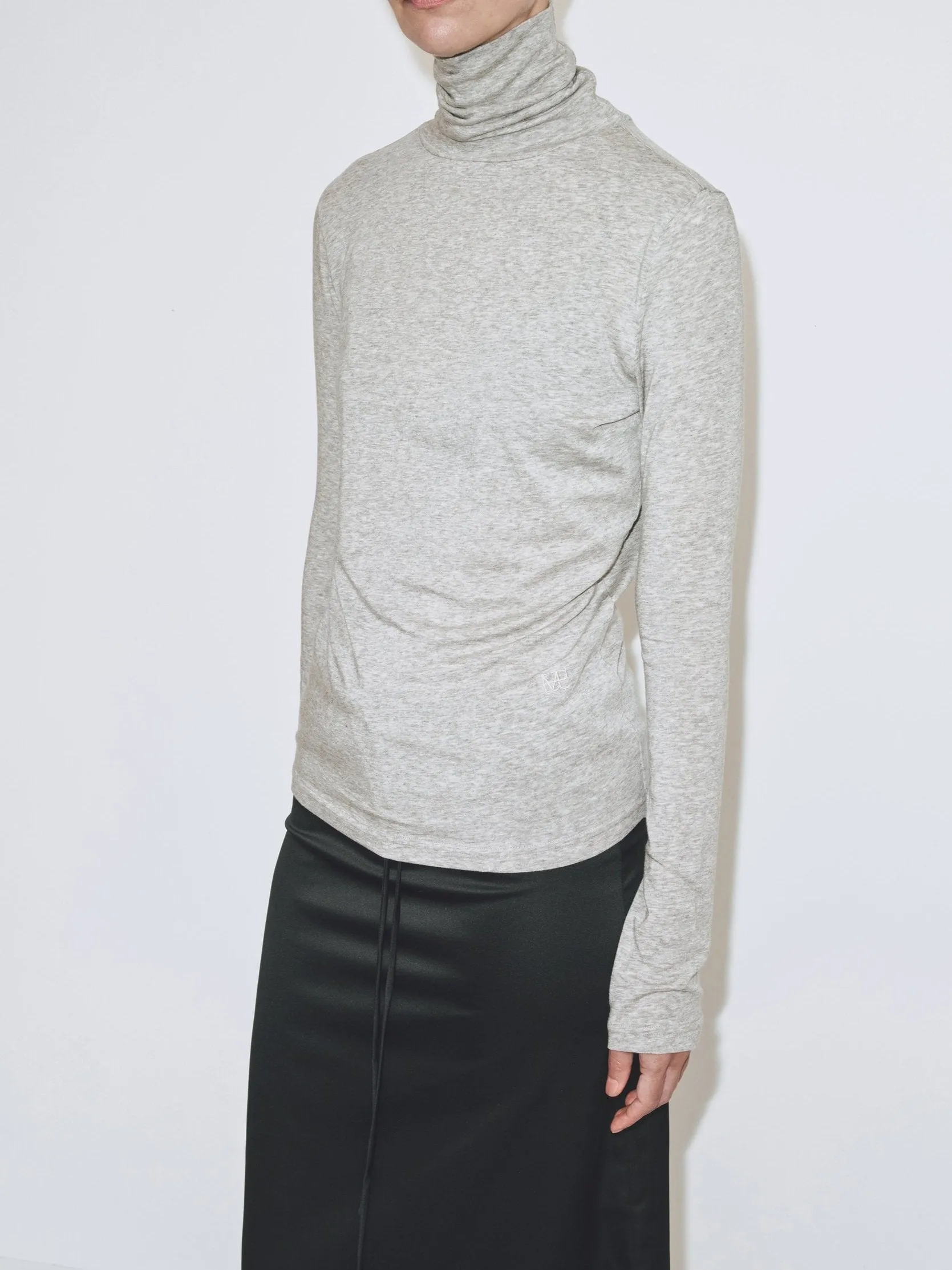 THIN RIBBED ROLL NECK TOP