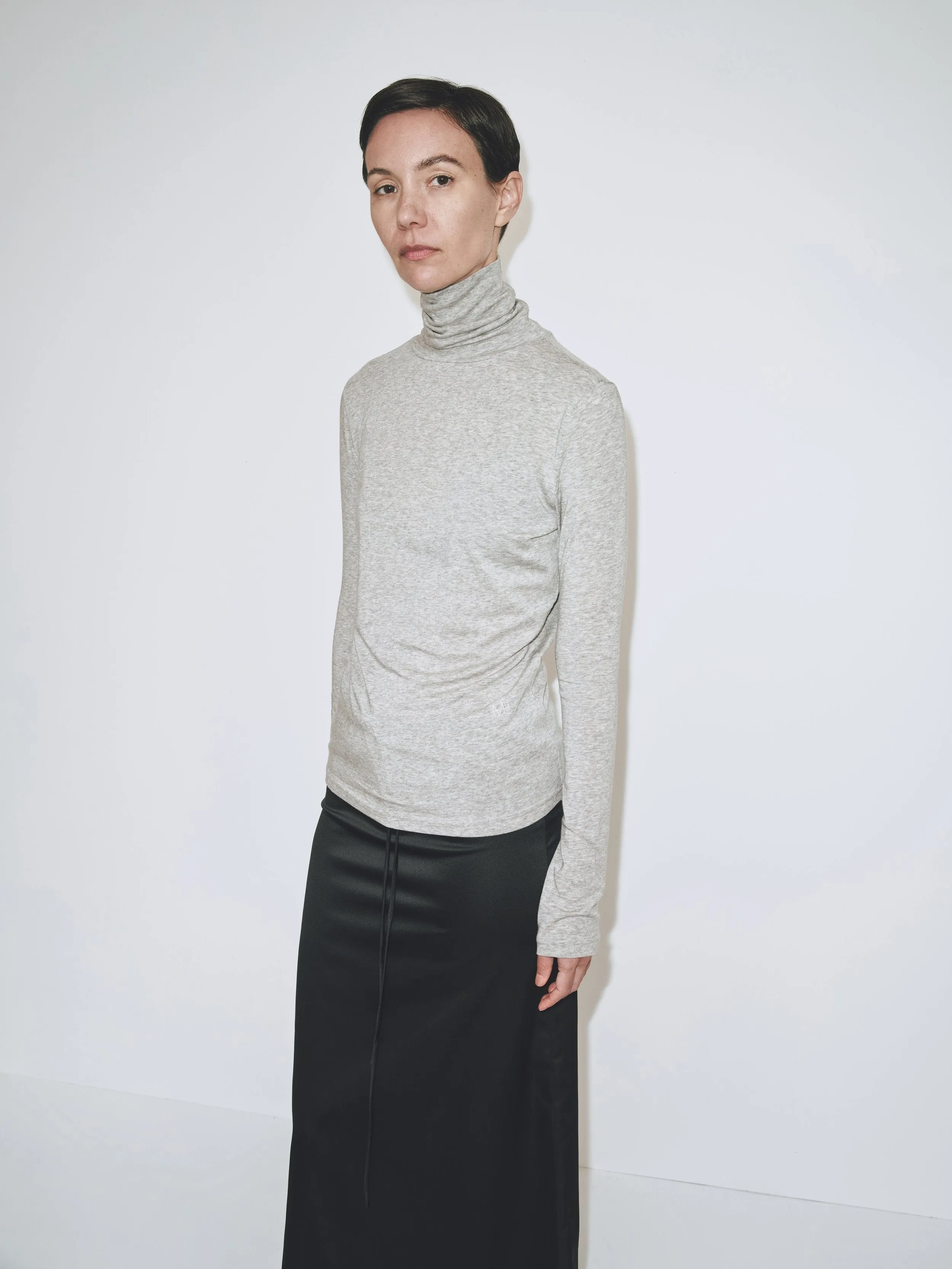 THIN RIBBED ROLL NECK TOP