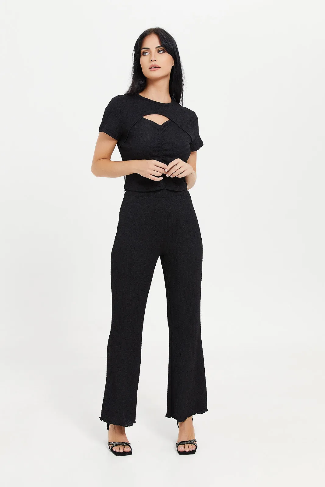 Women BlackTextured Flare Leg Trouser