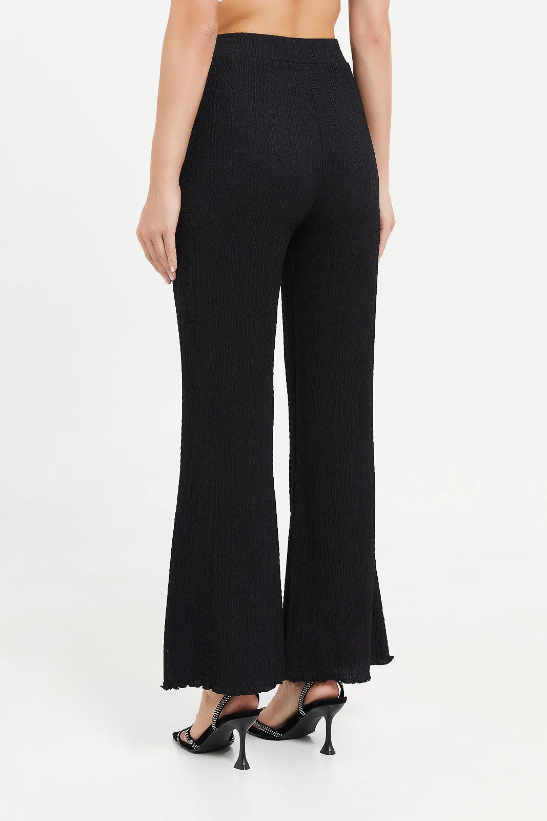 Women BlackTextured Flare Leg Trouser