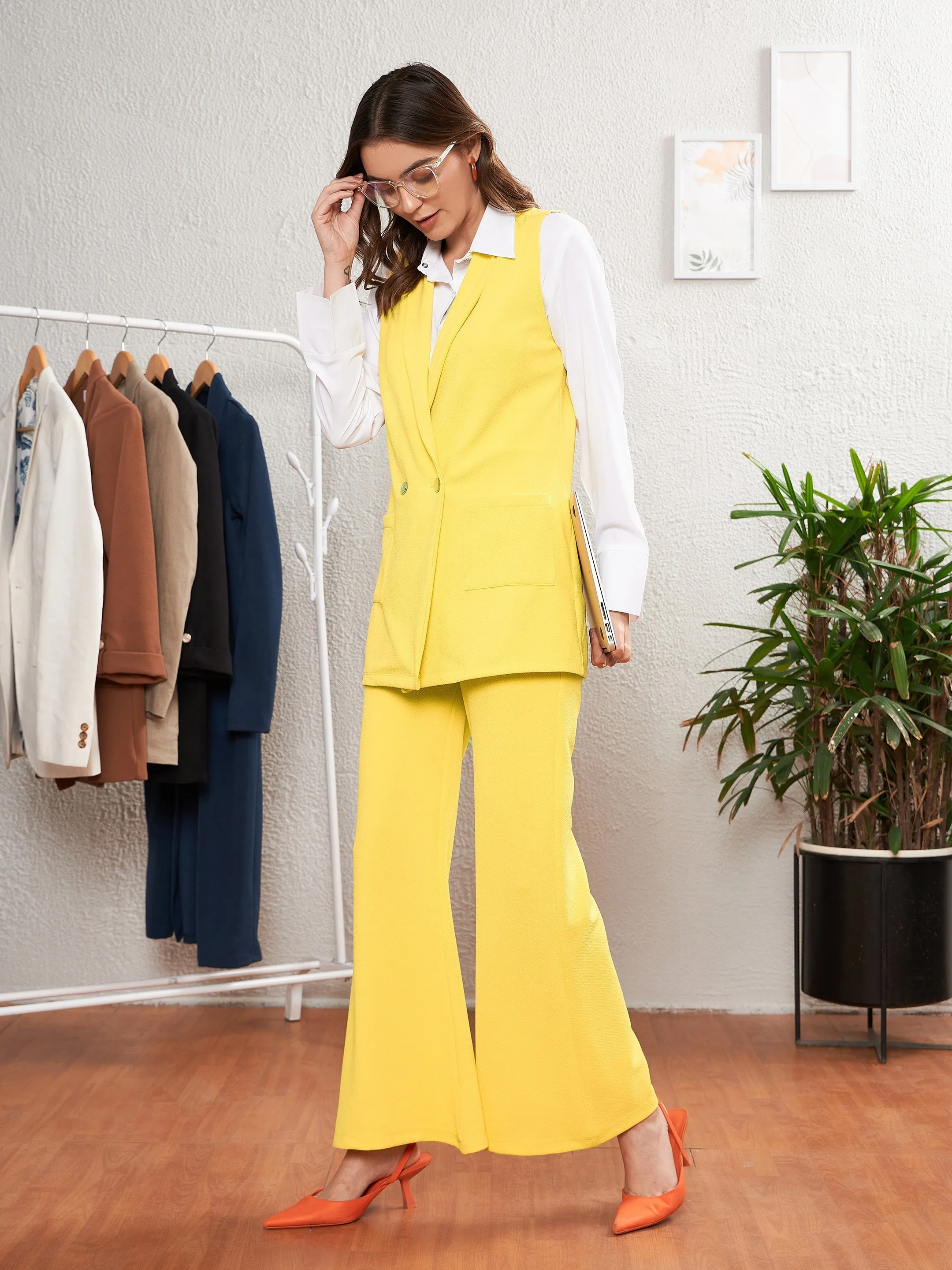 Women Yellow Sleeveless Blazer With Bell Bottom Pants