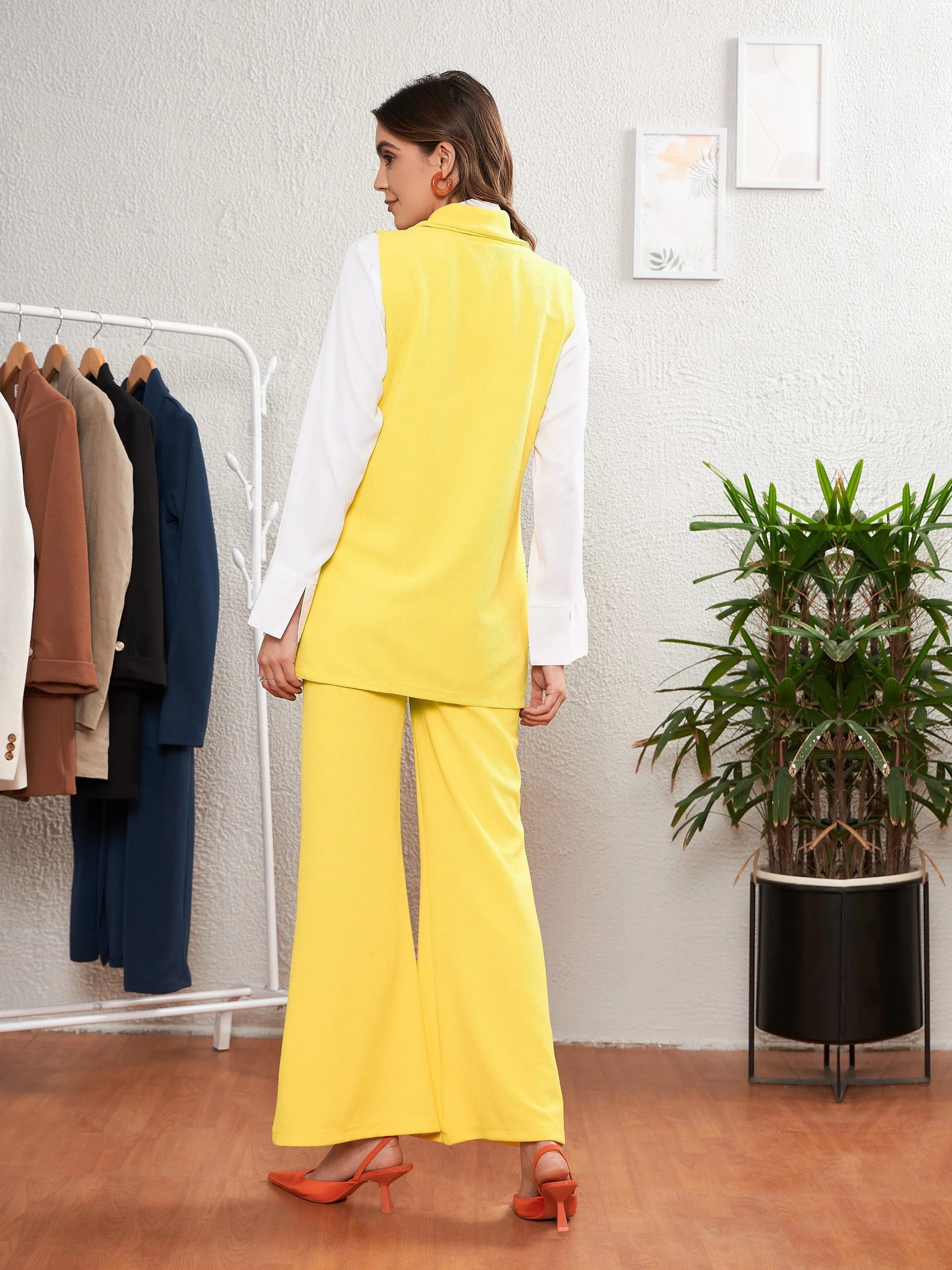 Women Yellow Sleeveless Blazer With Bell Bottom Pants